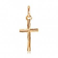 Zlat obesek - križ s podolgovatimi kraki in razčlenjeno površino