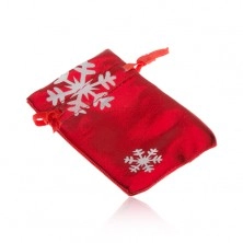 Drobna darilna škatlica v rdeči barvi, bele snežinke