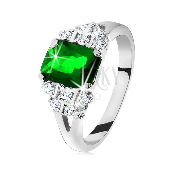 Lesketav prstan srebrne barve, smaragdno zelen cirkon, razdeljena kraka