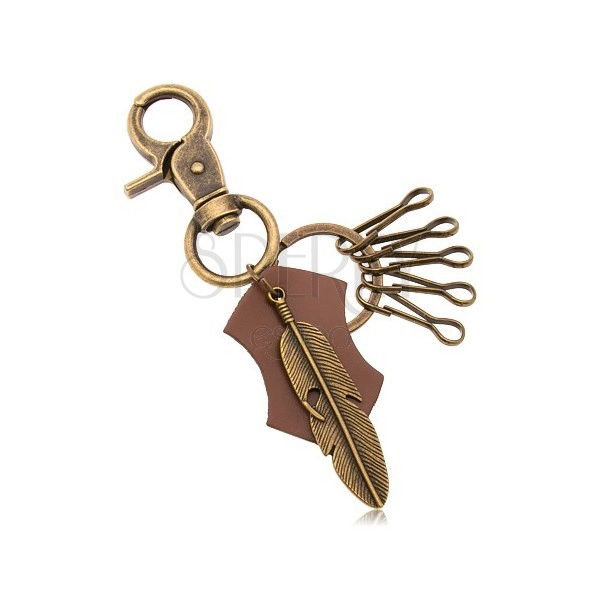 Obesek za ključe v medeninasti barvi - pas iz umetnega  usnja, veliko pero z izrezom