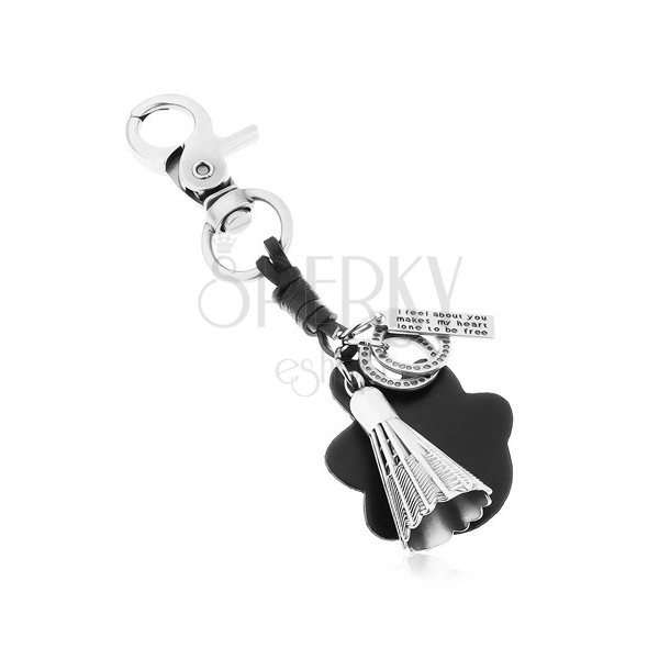 Obesek za ključe v sivi in črni barvi, pernata žogica za badminton, ploščica in obročka