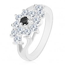 Prstan v srebrni barvi, razdeljena kraka, cvet iz prozornih cirkonov s črnim centrom