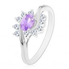 Bleščeč prstan srebrne barve, ovalen svetlo vijoličast cirkon, prozorni loki