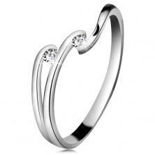 Diamantni prstan iz 14-k belega zlata – dva lesketava prozorna briljanta, sijoče linije krakov