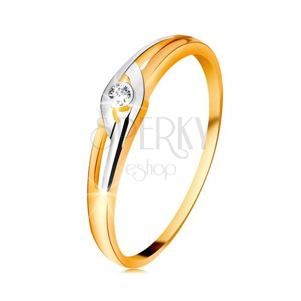 Diamantni prstan iz 14-k zlata, dvobarvna kraka z izrezi, prozoren briljant