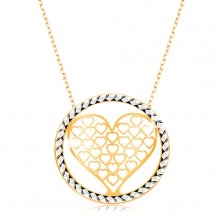 Ogrlica iz 9-k zlata – verižica iz ovalnih členov, srce z izrezi v krogu