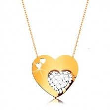 Ogrlica iz 9-k zlata – tanka verižica, veliko srce, okrašeno z izrezi srčka