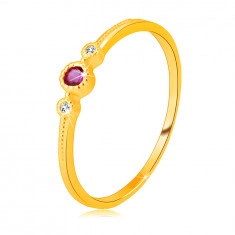Diamantni prstan iz 14K rumenega zlata - rubin v okvirju, prozoren brilijant, drobne kroglice