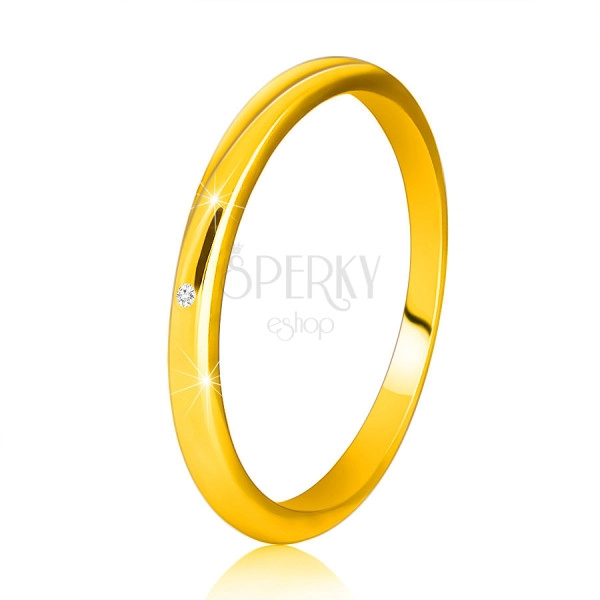 Diamantni prstan iz 14K rumenega zlata  - tanka, gladka kraka, prozoren briljant