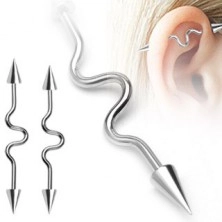 Industrijski piercing za uho z vijugo in koničastima bunkicama