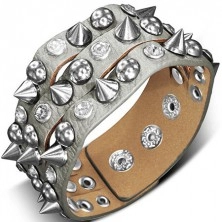 Zapestnica, narejena iz usnja - srebrna s konicami, polkroglami in umetnimi kamenčki